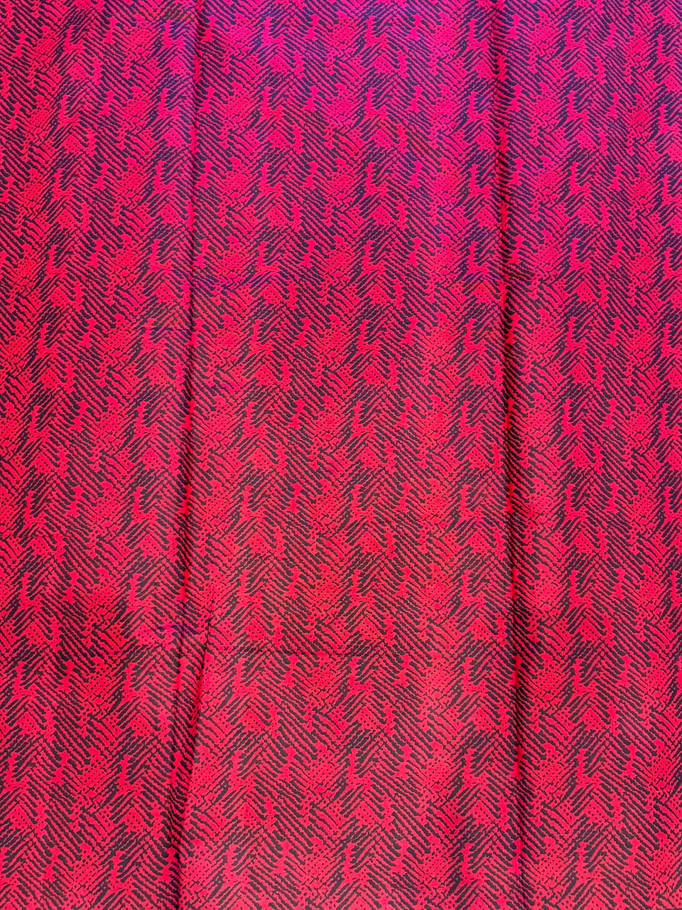 Close-up of a red and black patterned fabric