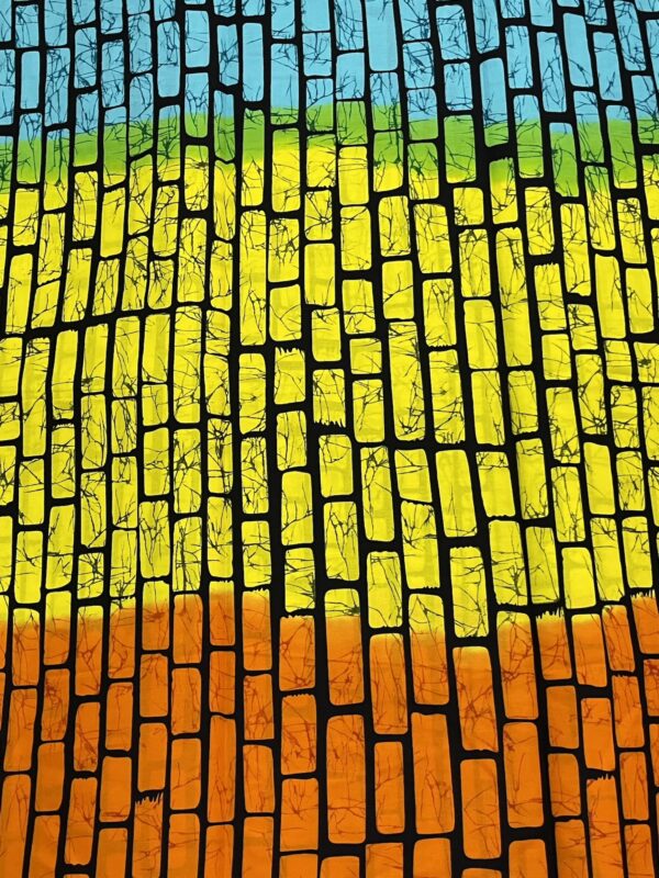 Colorful mosaic pattern with blue, green, yellow, and orange tiles.