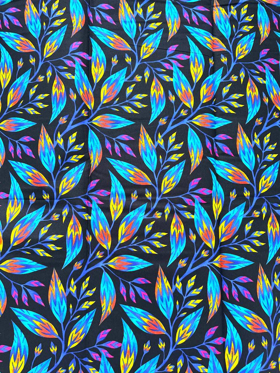 Colorful leaf pattern on a black background