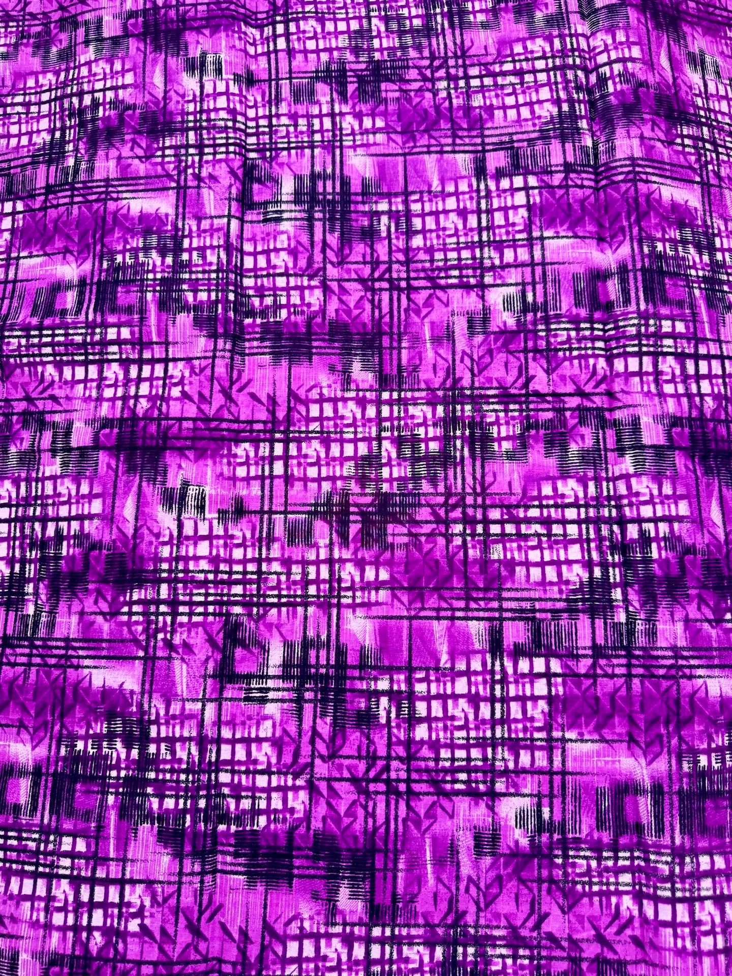 Purple fabric with black geometric pattern