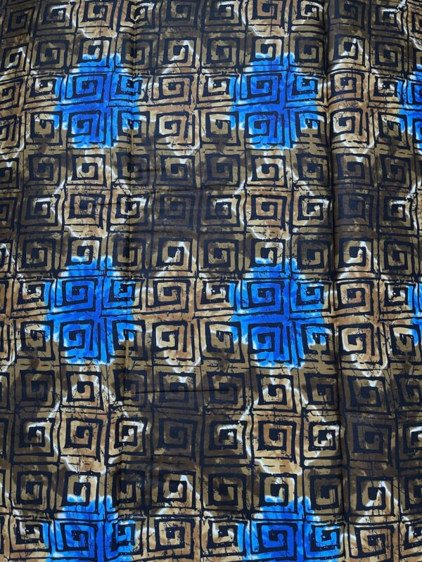 Textile with geometric pattern and blue cross-like shapes