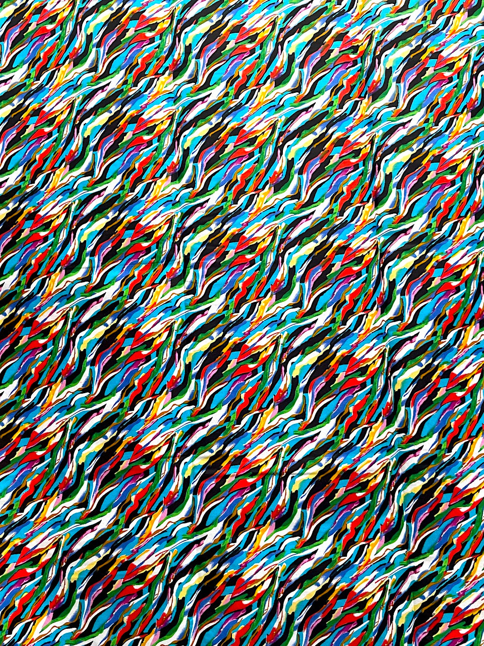 Abstract pattern with multicolored wavy lines on a textured background