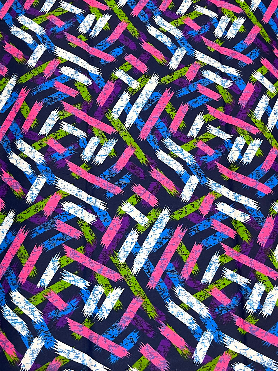 Colorful geometric pattern on a dark background