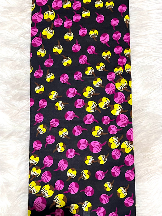 Phone case with pink and yellow floral pattern on a black background