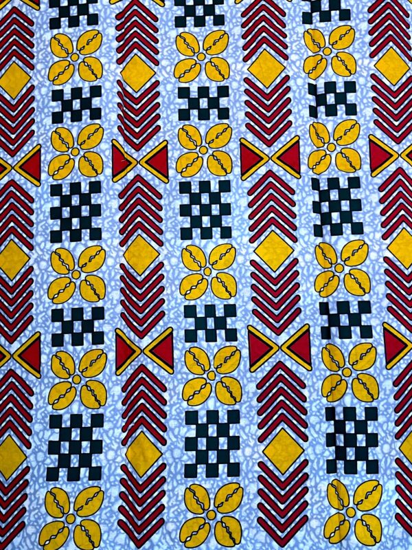 Patterned fabric with geometric and floral designs on a blue background