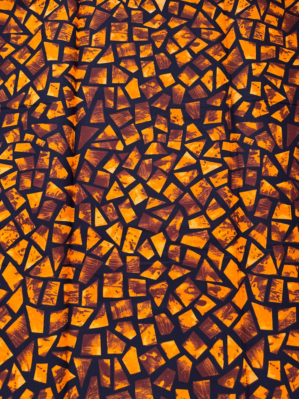 Pattern of stacked wooden planks with a dark brown and orange color scheme.
