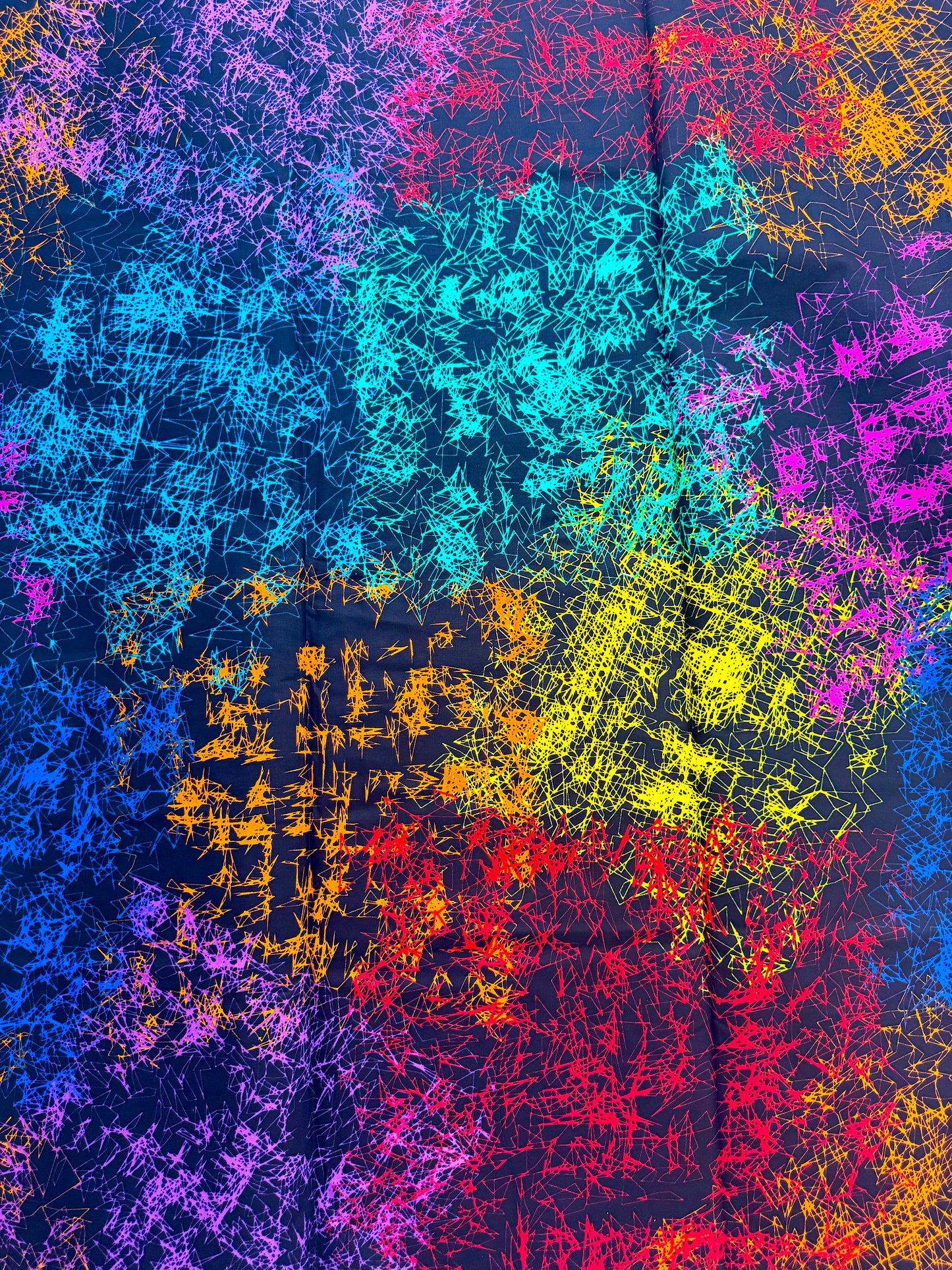 Colorful abstract pattern with a star-like shape in the center.