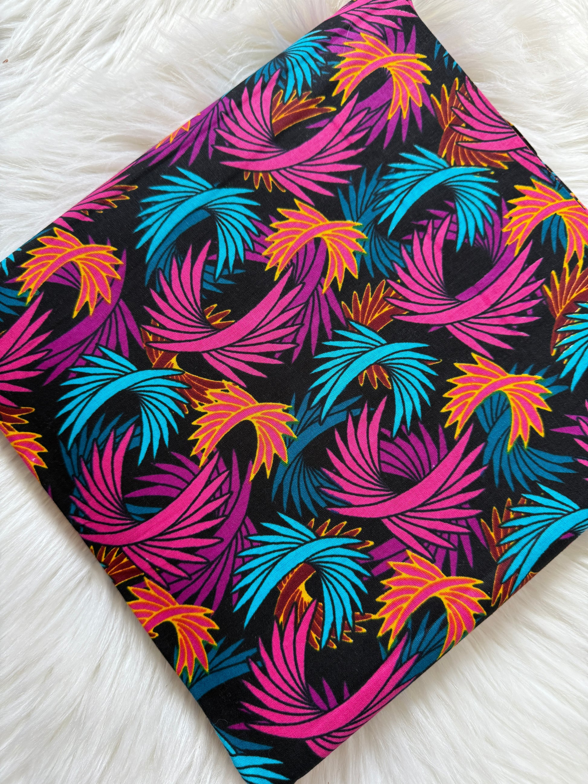 Colorful leaf pattern on a black background