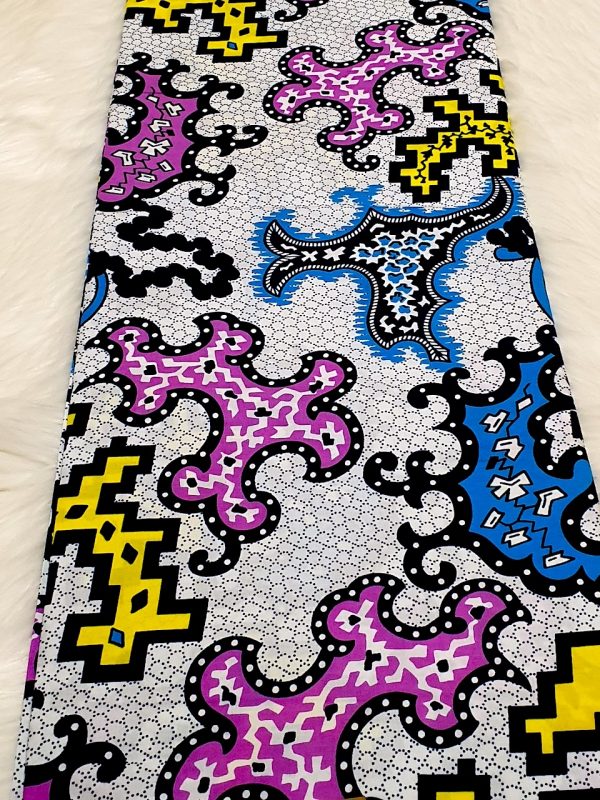 Colorful fabric with abstract patterns on a beige background