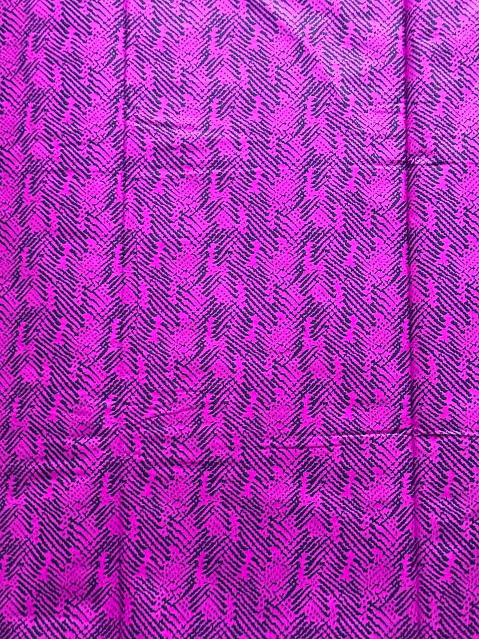 Purple fabric with a subtle pattern