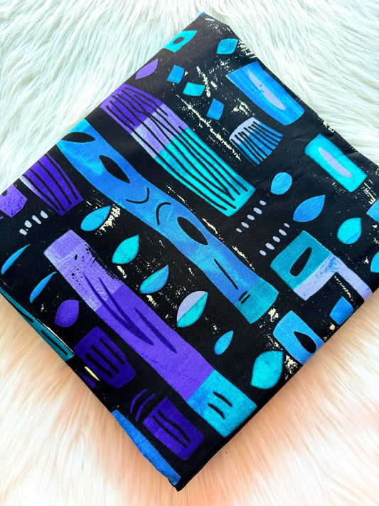 Colorful patterned box on a light wooden surface