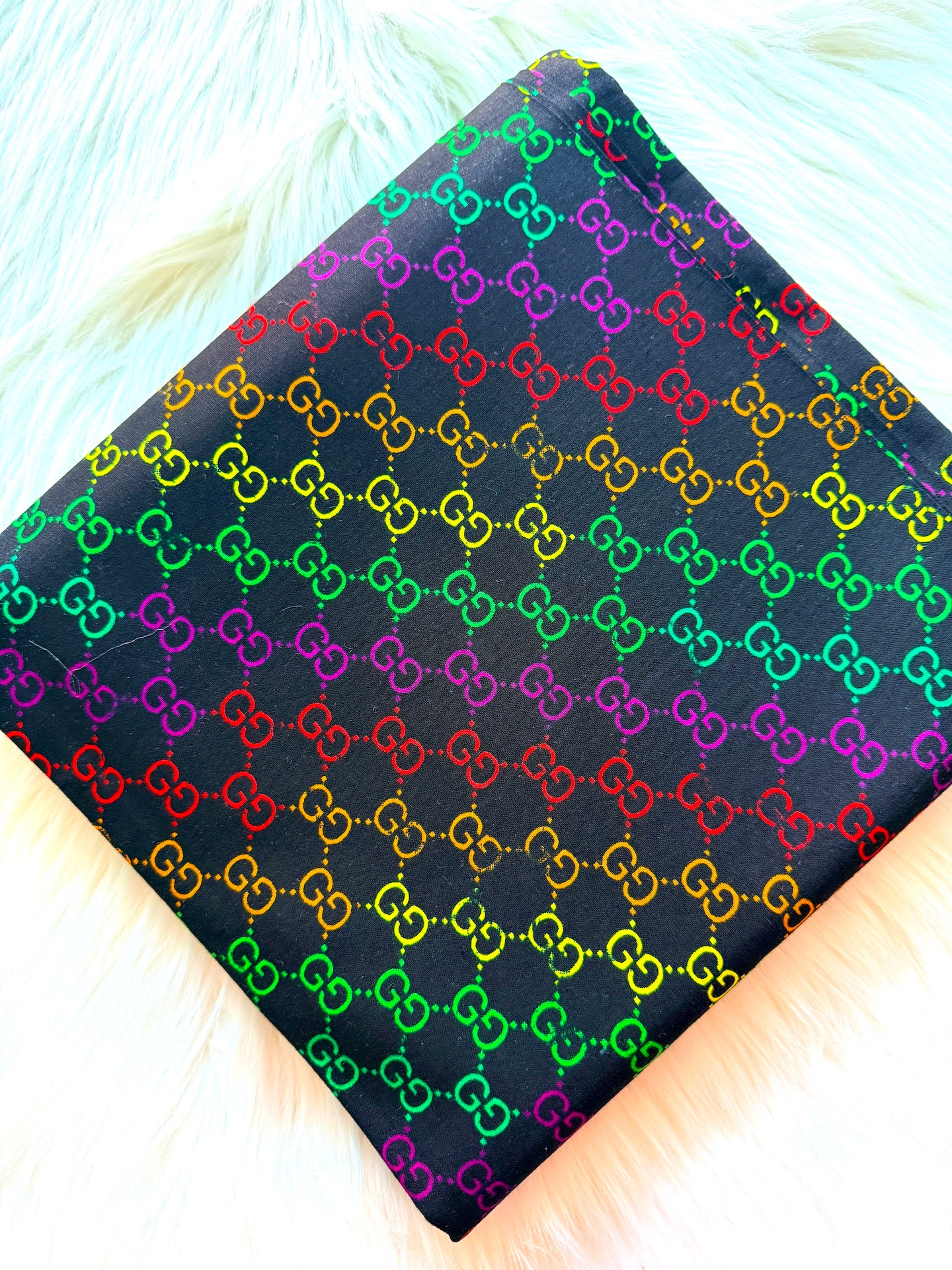 Multicolored patterned fabric on a black background