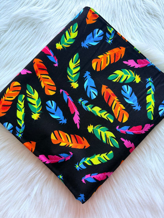 Colorful feather pattern on a black background
