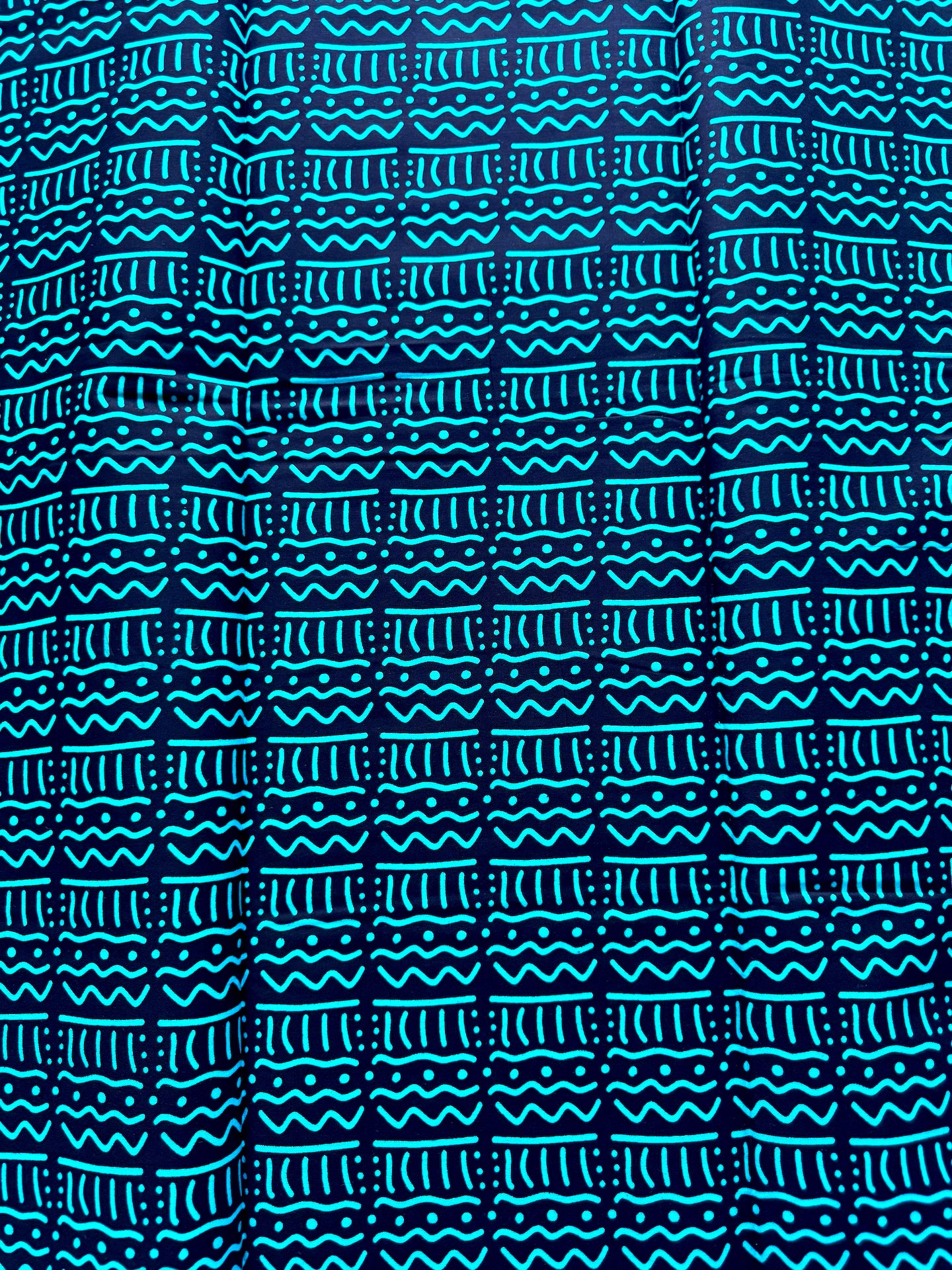 Patterned fabric with blue and black design