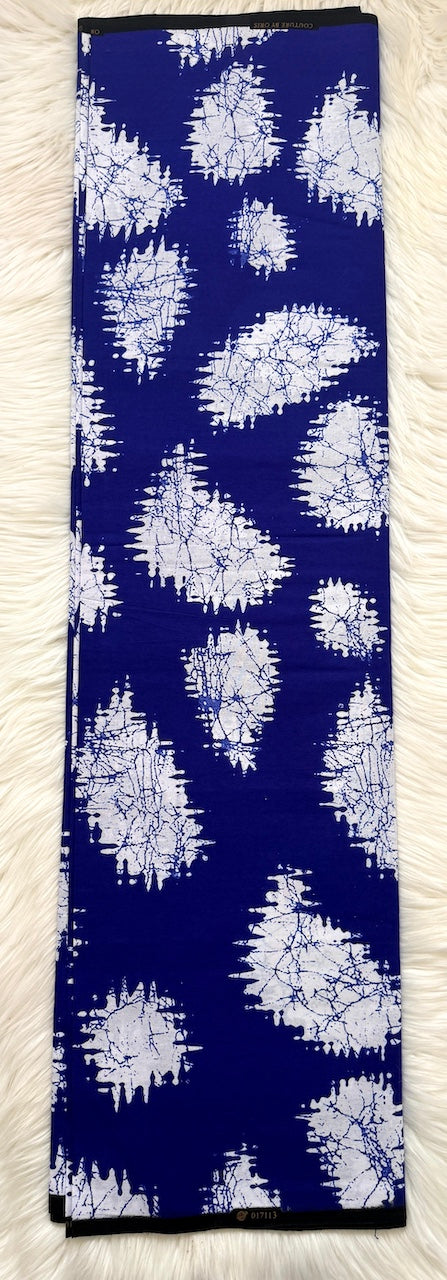 Blue fabric with white geometric pattern on a white background