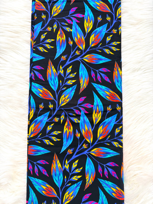 Colorful leaf pattern on a black background