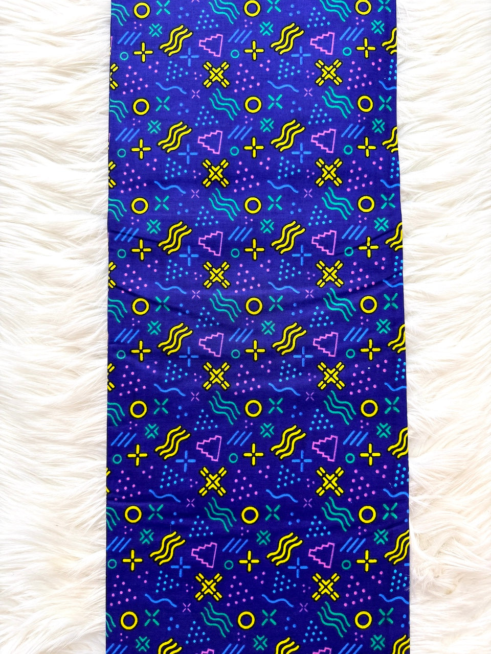 Yoga mat with geometric pattern on a white background
