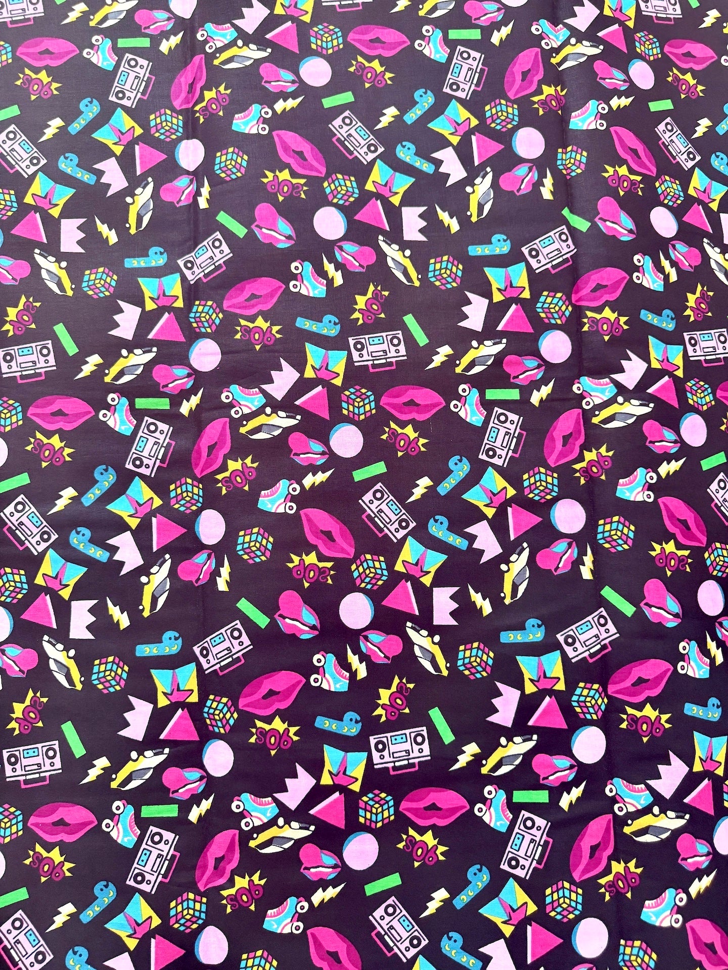 Colorful retro pattern with icons on a dark background