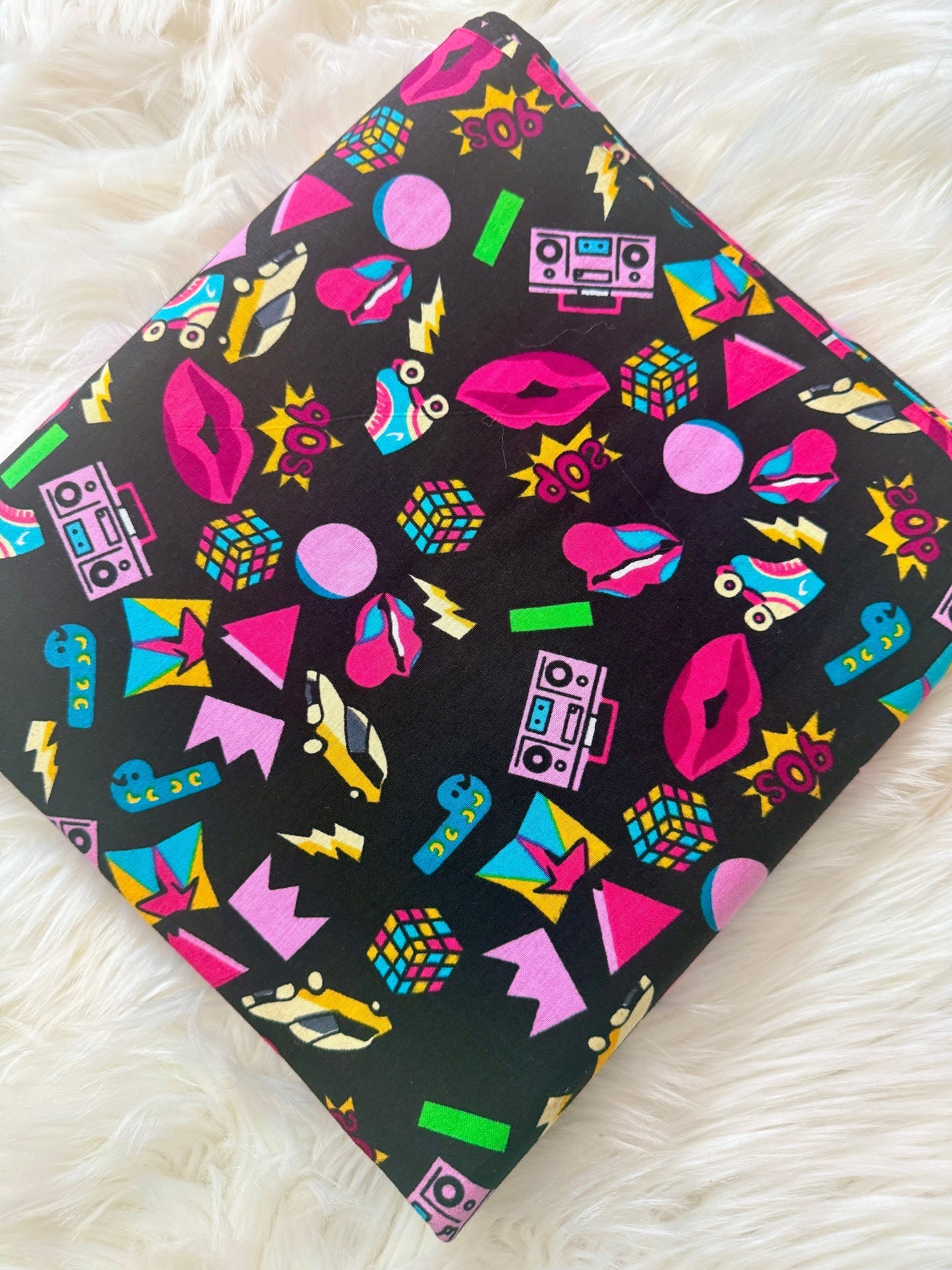 Colorful patterned product on a white fluffy surface