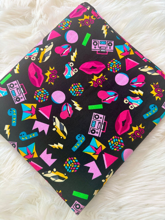 Colorful patterned product on a white fluffy surface