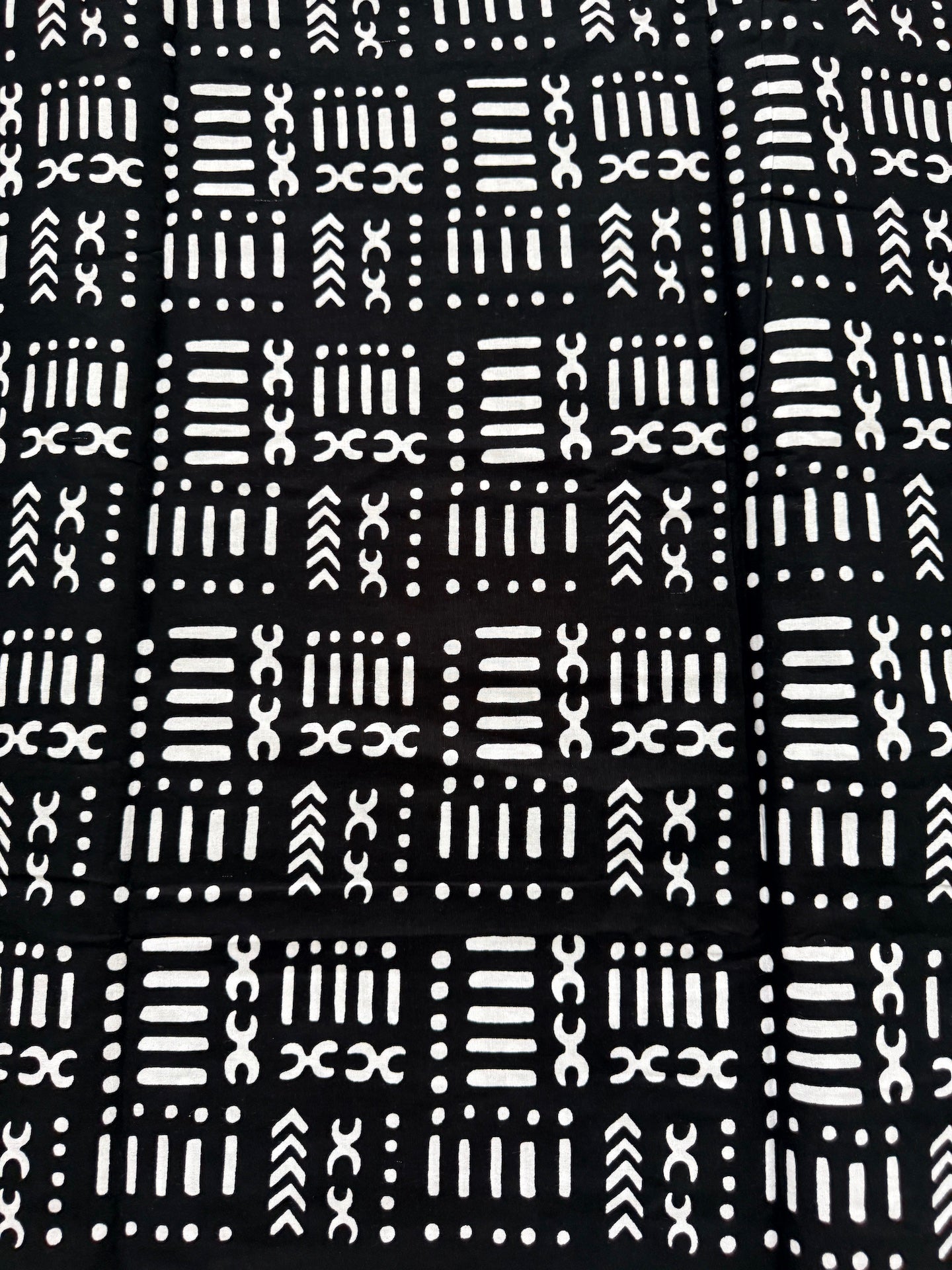 Black fabric with white geometric pattern