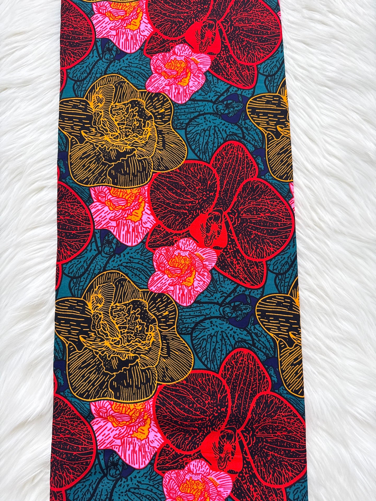 Colorful floral patterned tie on a white background