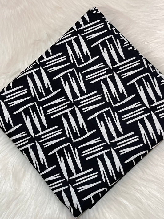 Black and white patterned fabric on a white background