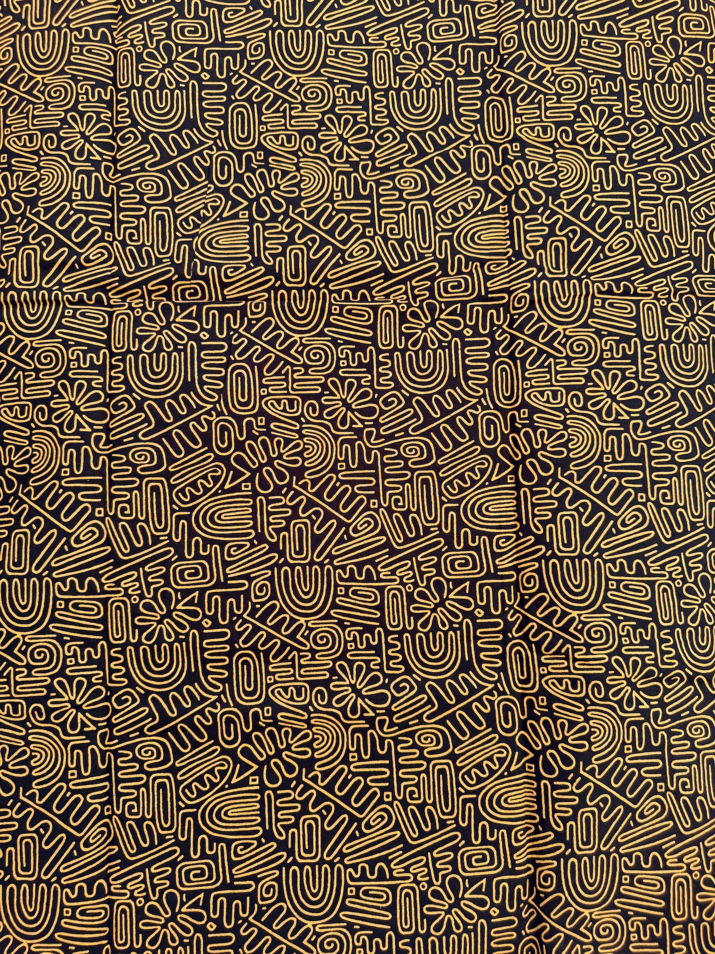 Pattern of abstract shapes and text on a black background