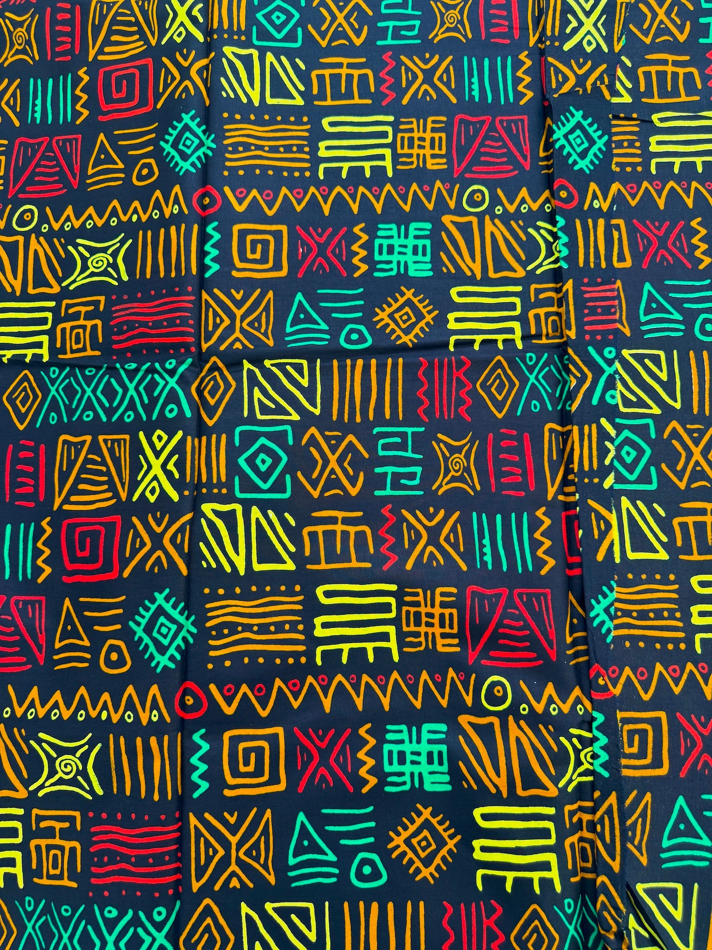 Colorful geometric pattern on a dark background