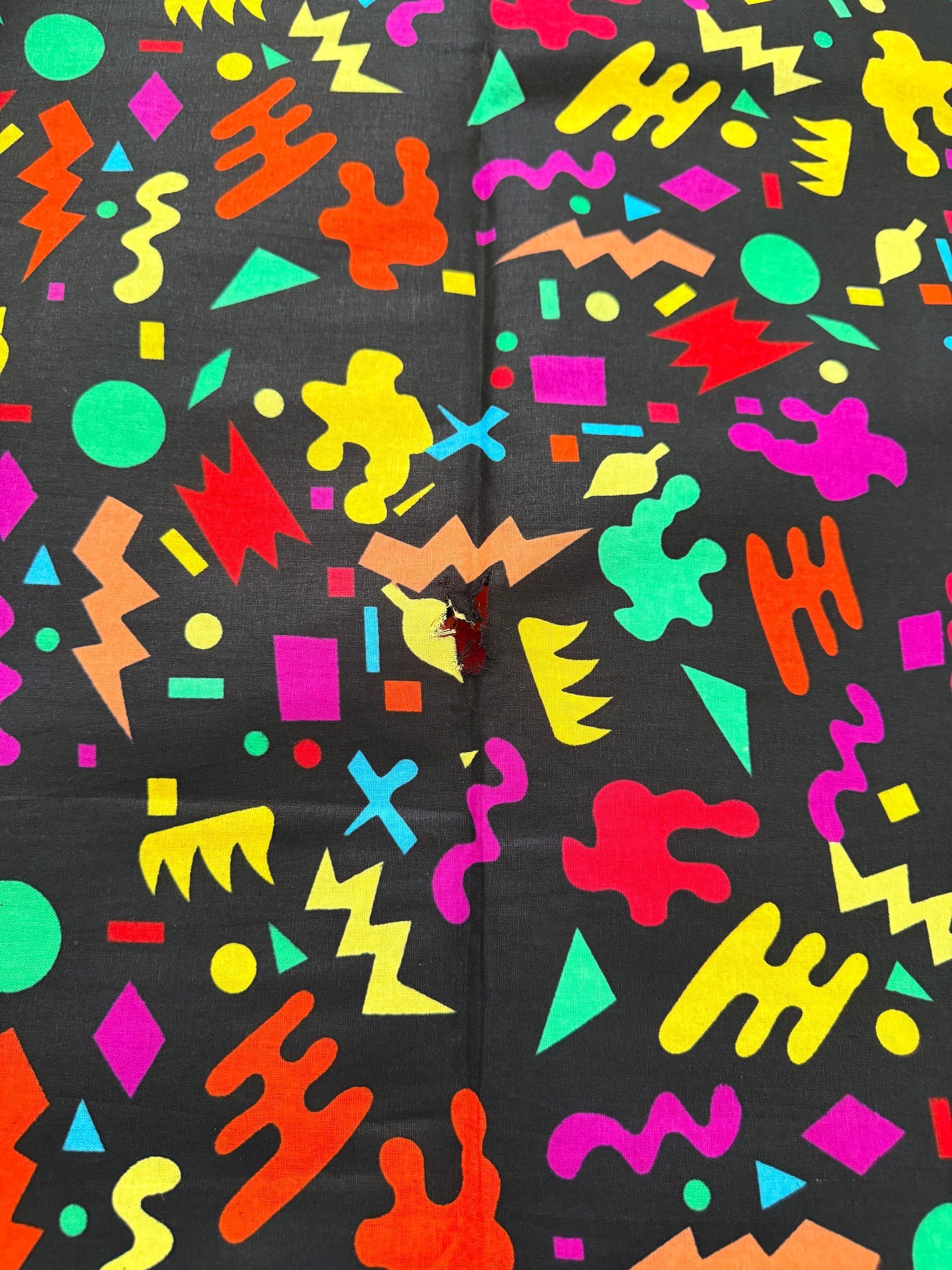 Colorful geometric pattern on a black background