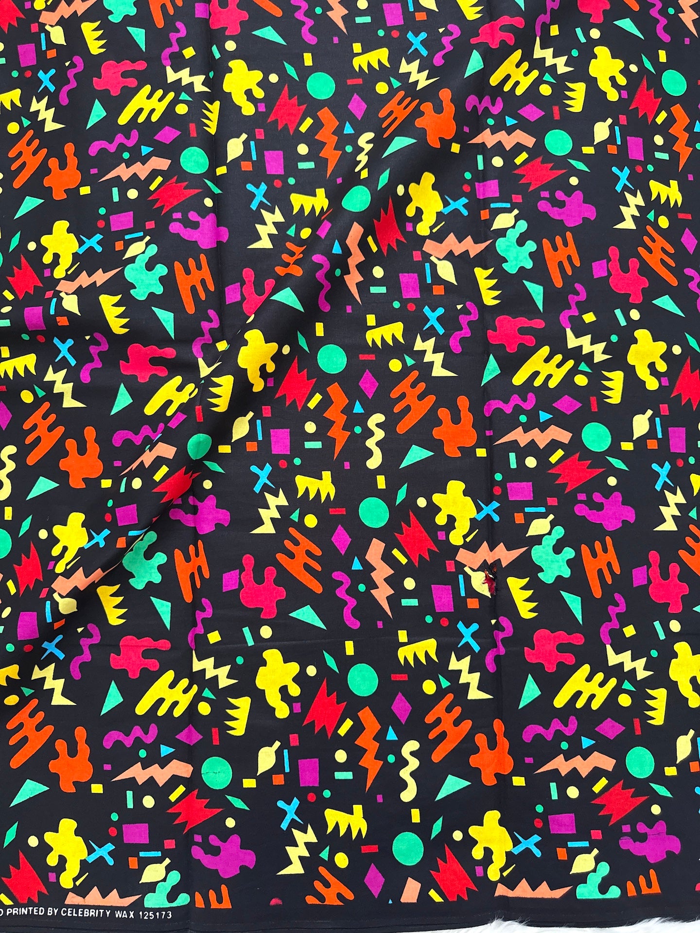 Colorful geometric pattern on a black background