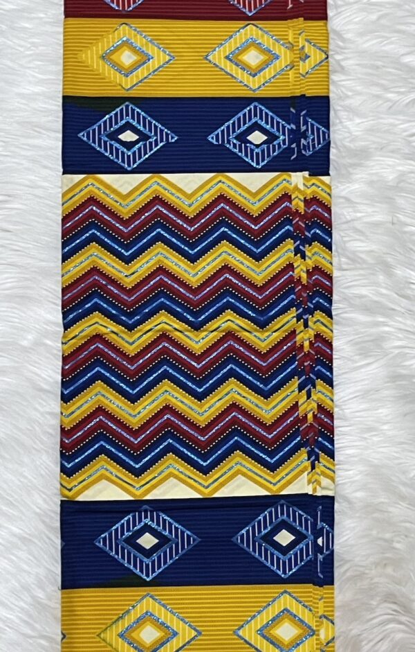 Colorful fabric with geometric patterns on a white background