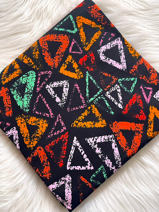 Colorful triangle pattern on a black background