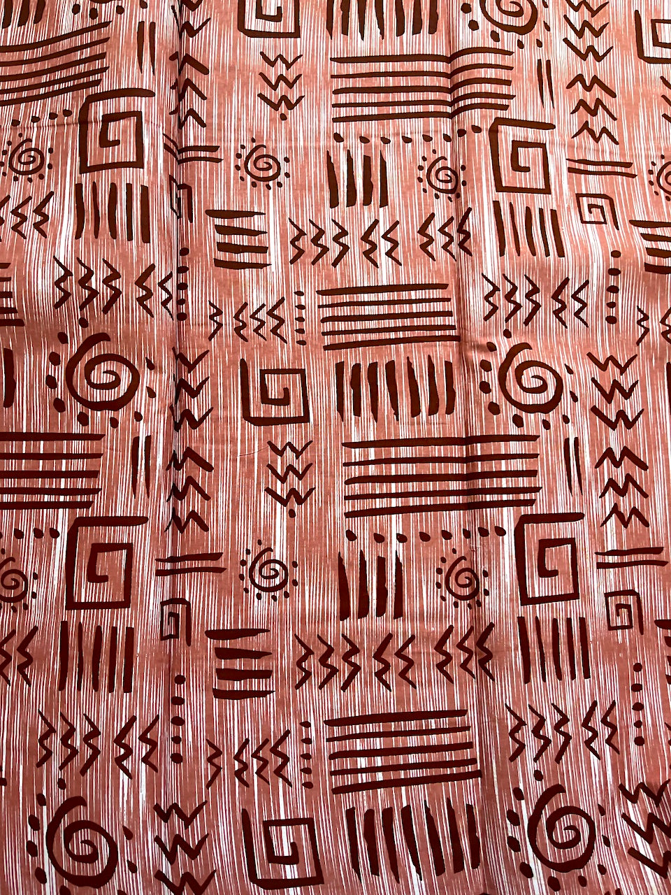 Wooden surface with engraved geometric patterns