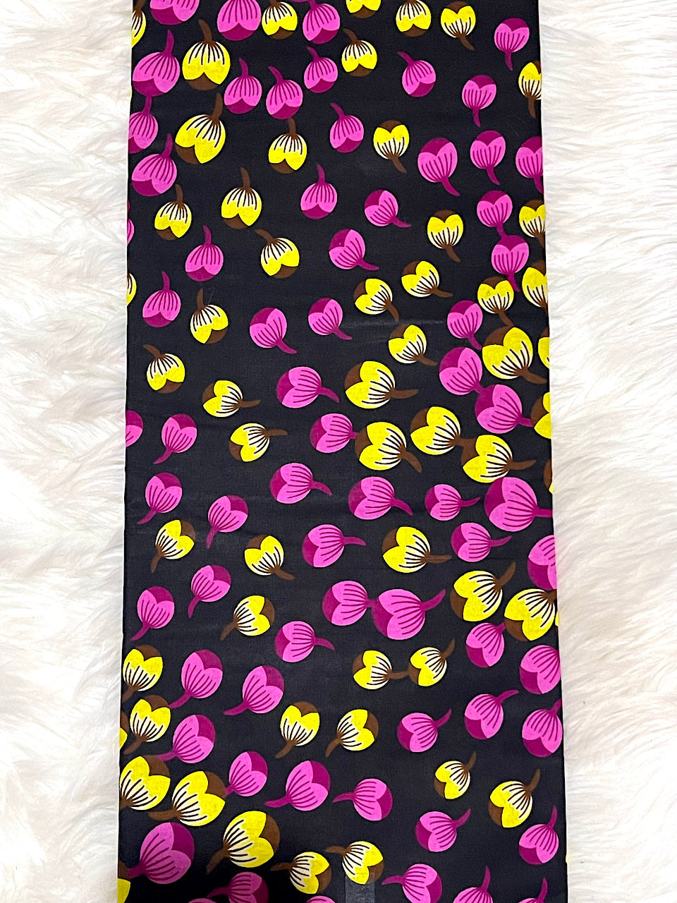 Phone case with pink and yellow floral pattern on a black background