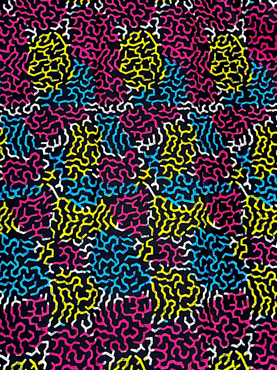 Colorful abstract pattern with wavy lines on a black background