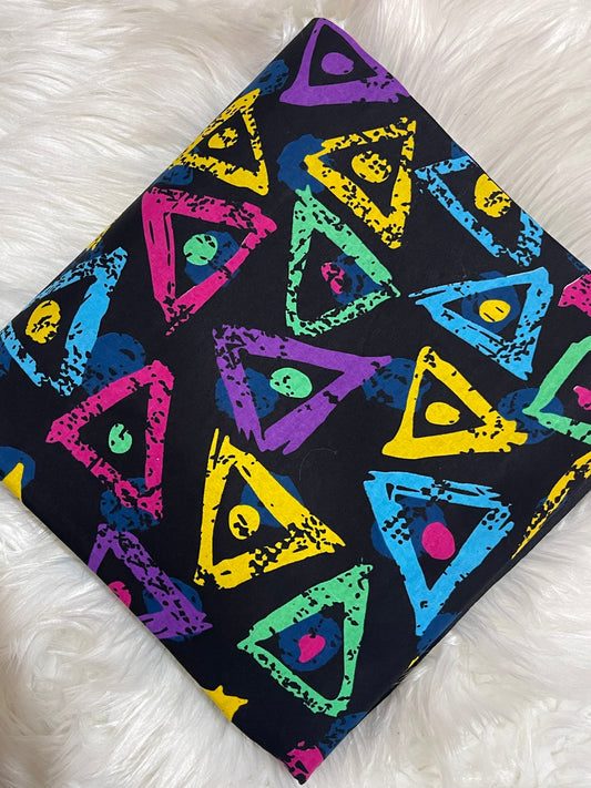 Colorful triangle pattern on a black background