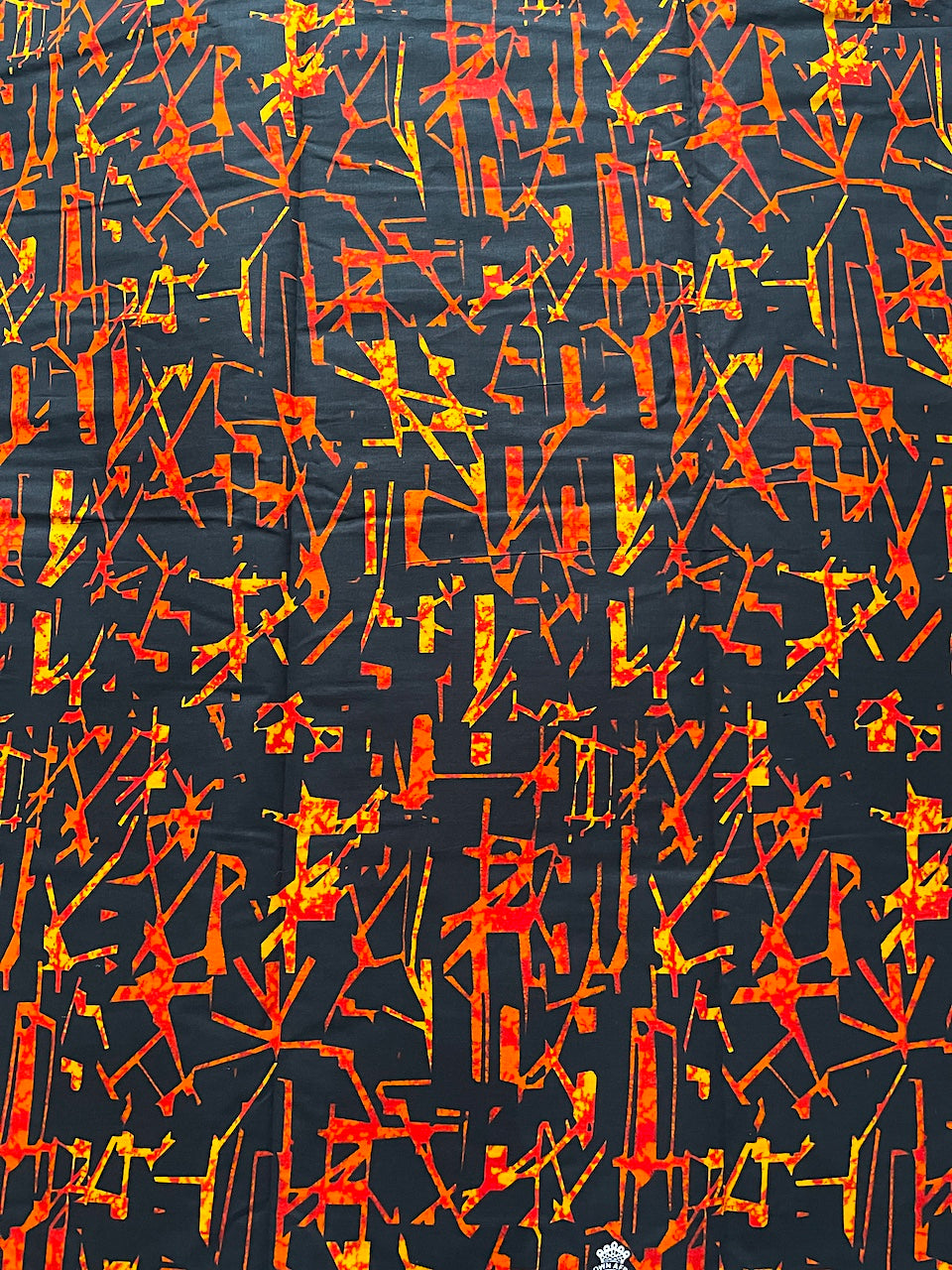 Abstract pattern with orange and yellow strokes on a black background