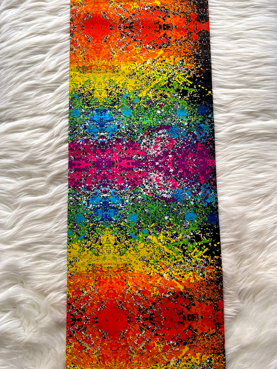 Colorful abstract painting on a textured white surface
