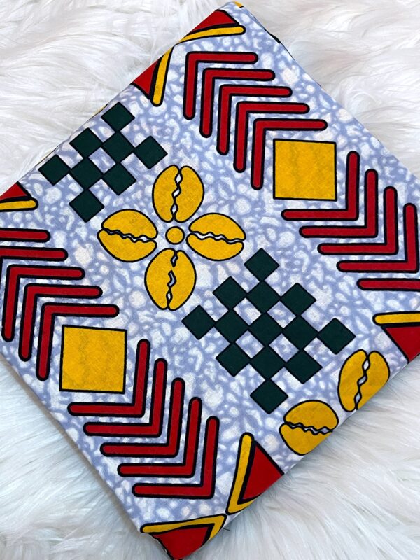 Colorful fabric with geometric patterns on a white background