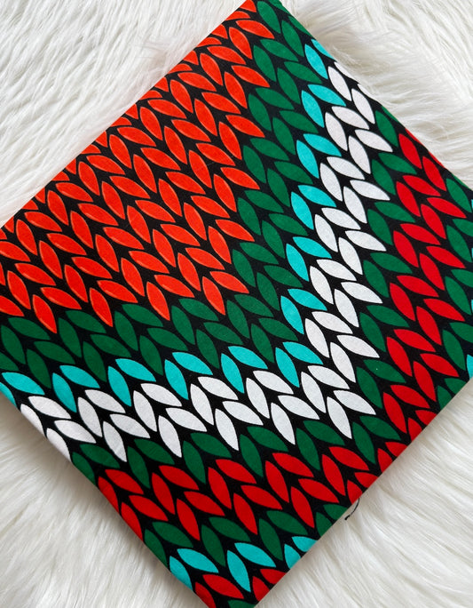 Colorful woven pattern on a textured surface