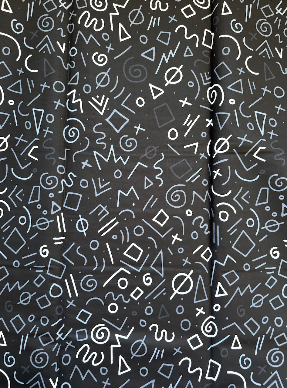 Black fabric with white geometric pattern