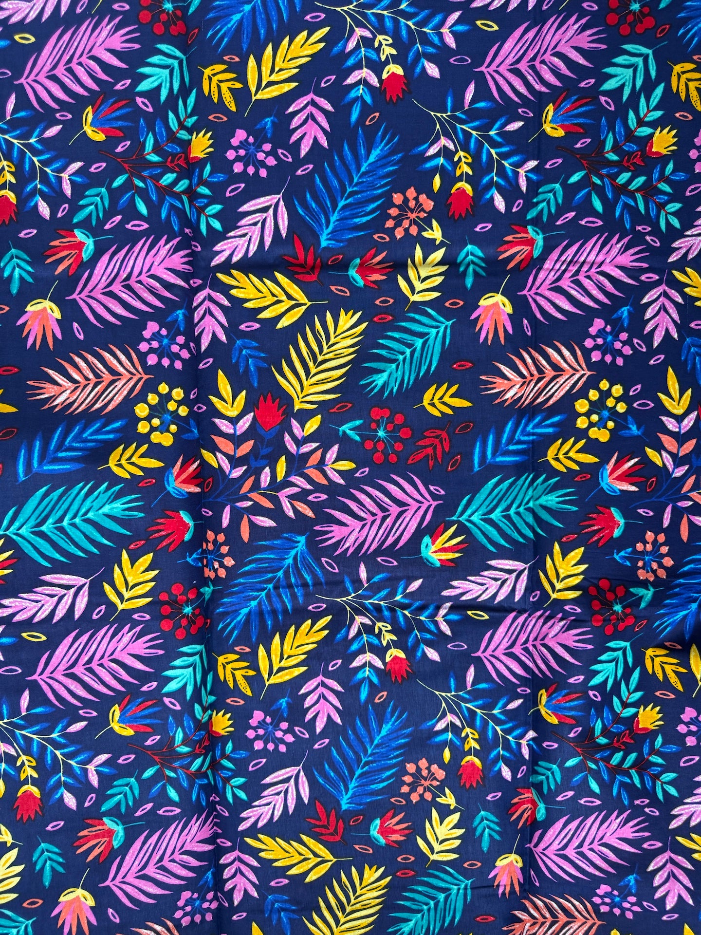Colorful leaf pattern on a dark blue background