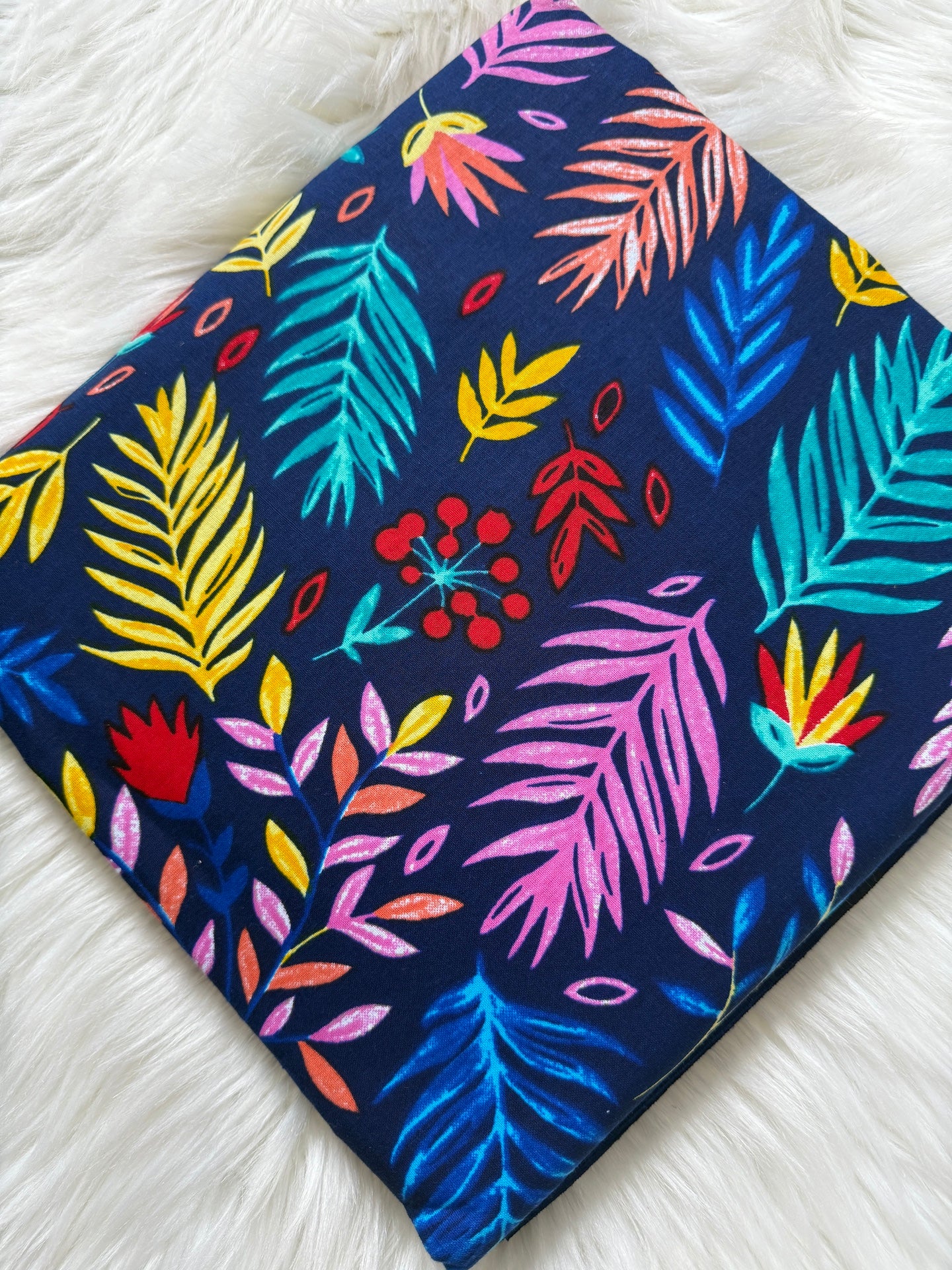 Colorful leaf pattern on a dark blue background