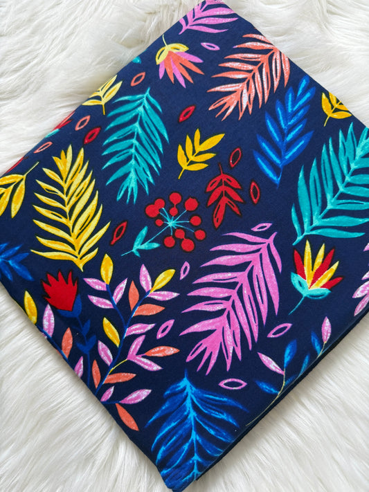 Colorful leaf pattern on a dark blue background