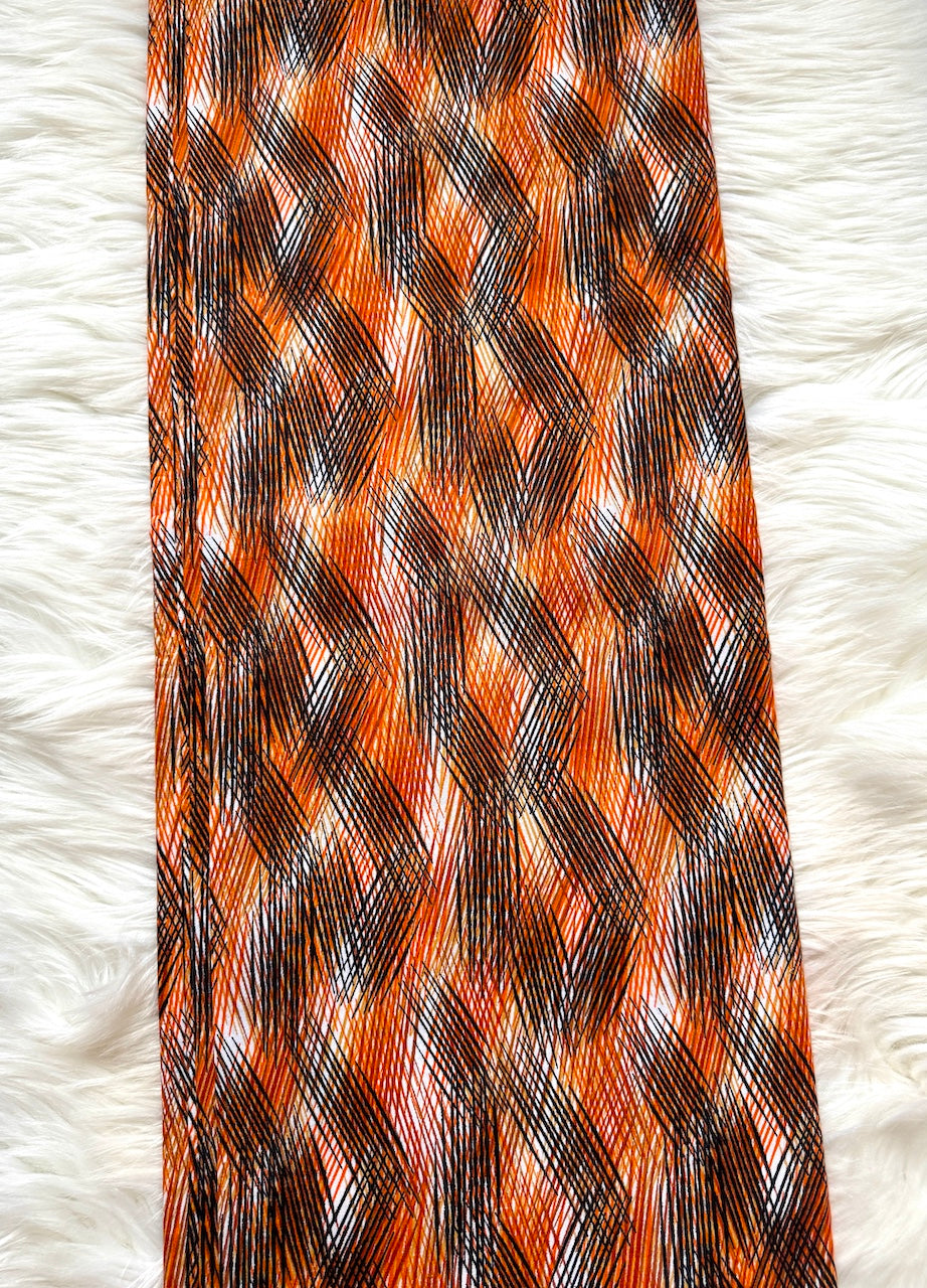 Patterned tie on a white textured background