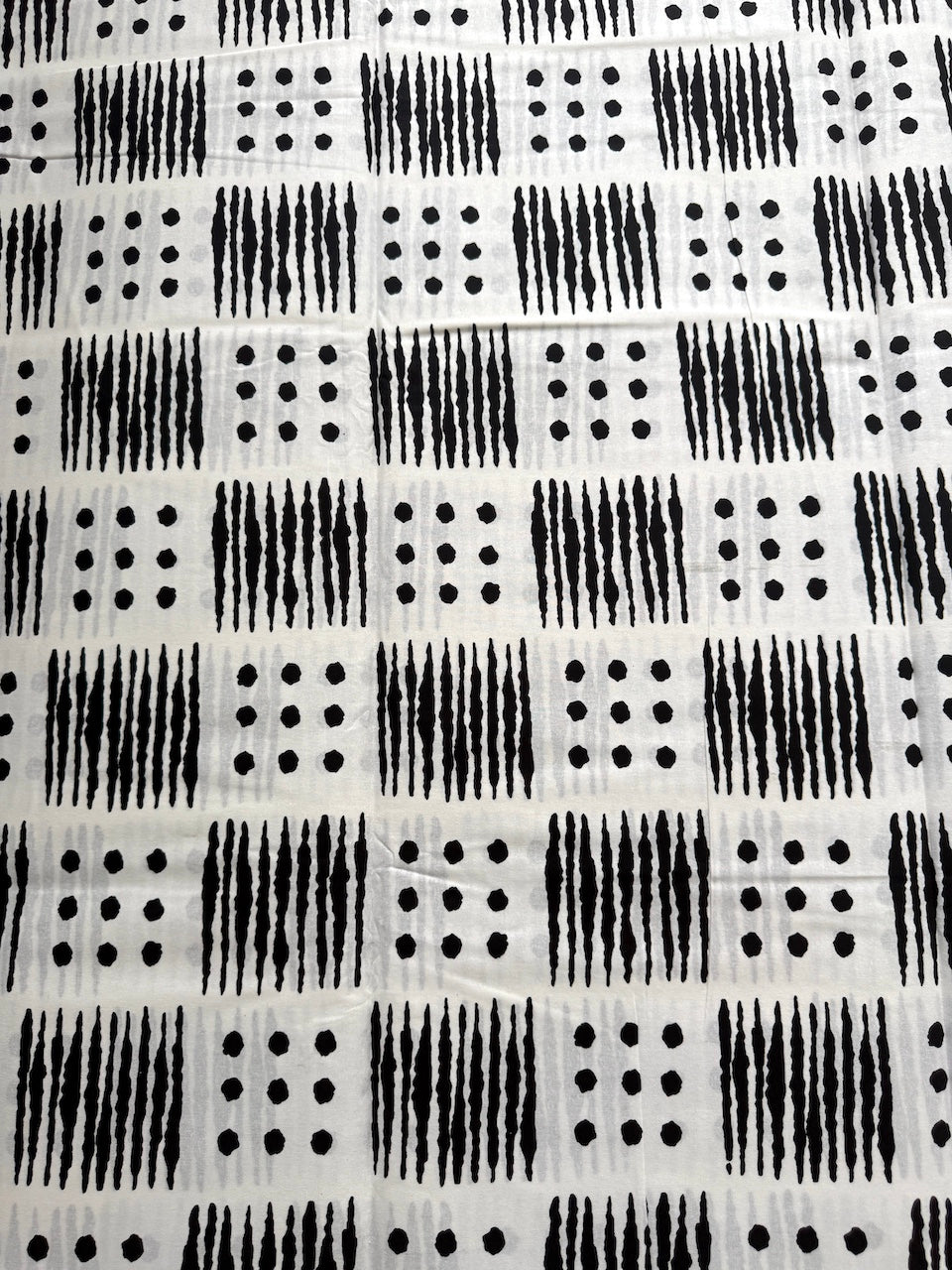 Black and white patterned fabric with geometric design