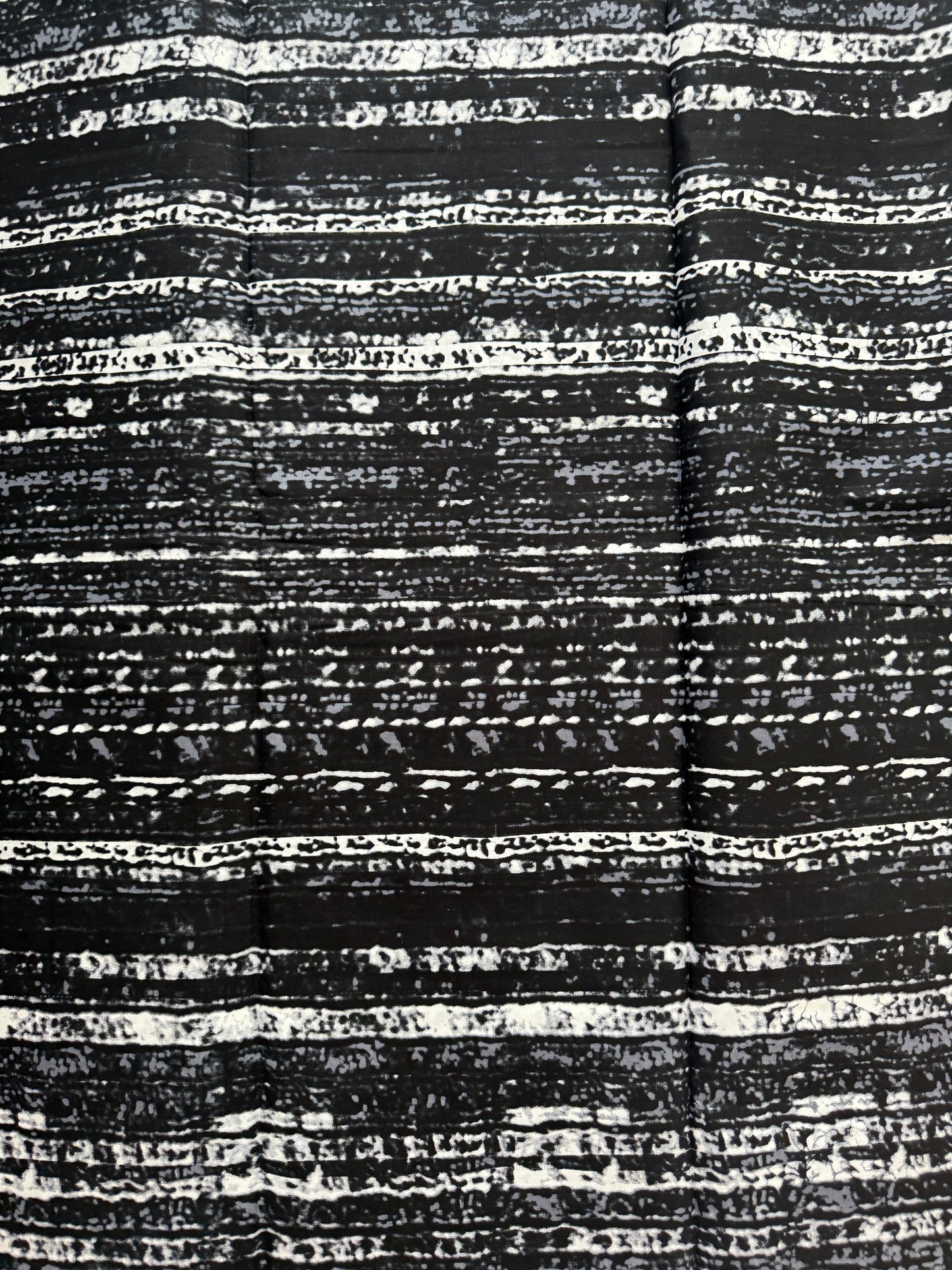 Close-up of black and white textured fabric pattern