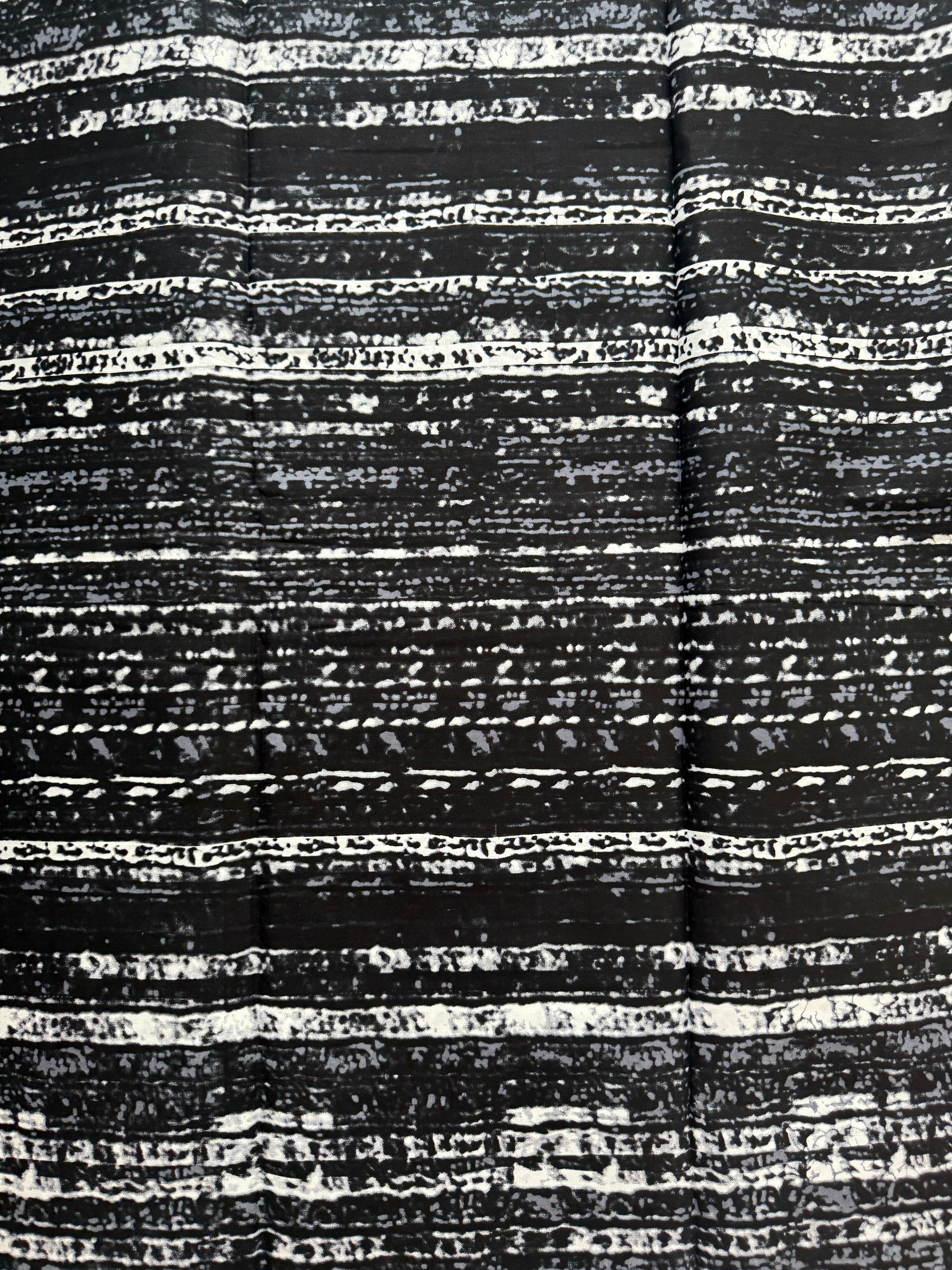 Close-up of black and white textured fabric pattern