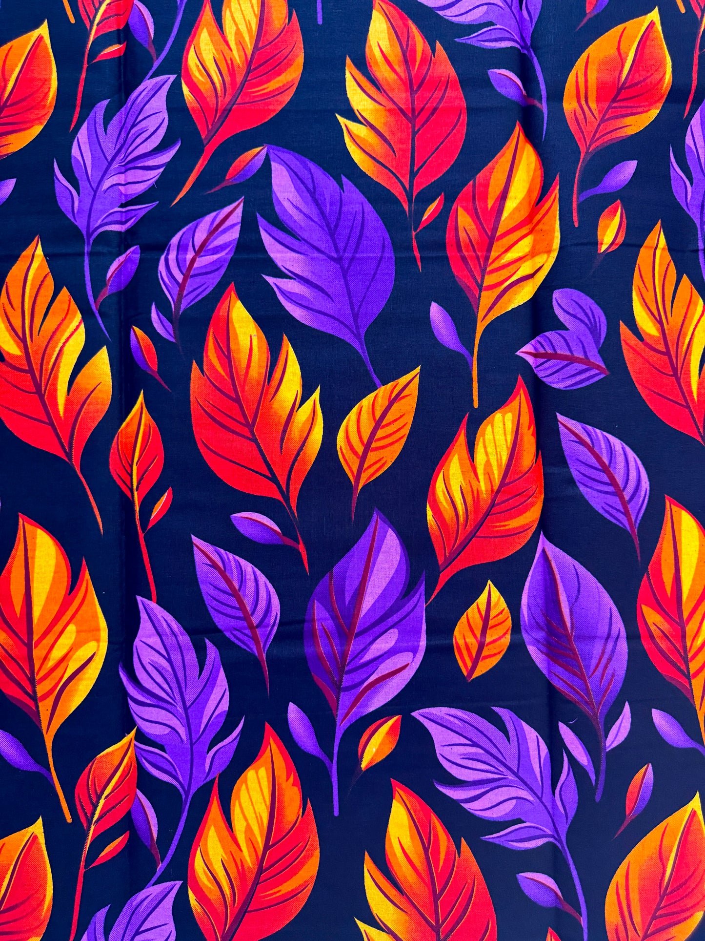 Colorful leaf pattern on a dark background
